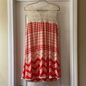 Orange patterned dress with lace neck detail by Entro size Medium